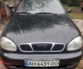 Черный Дэу Ланос, объемом двигателя 1.5 л и пробегом 230 тыс. км за 2200 $, фото 1 на Automoto.ua