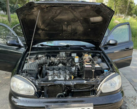 Черный Дэу Ланос, объемом двигателя 1.5 л и пробегом 300 тыс. км за 2400 $, фото 2 на Automoto.ua