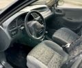 Черный Дэу Ланос, объемом двигателя 1.5 л и пробегом 216 тыс. км за 1650 $, фото 4 на Automoto.ua
