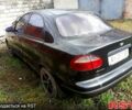 Черный Дэу Ланос, объемом двигателя 1.5 л и пробегом 0 тыс. км за 600 $, фото 1 на Automoto.ua