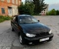 Черный Дэу Ланос, объемом двигателя 1.5 л и пробегом 228 тыс. км за 2000 $, фото 1 на Automoto.ua