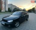 Черный Дэу Ланос, объемом двигателя 1.5 л и пробегом 230 тыс. км за 2500 $, фото 1 на Automoto.ua