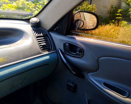 Черный Дэу Ланос, объемом двигателя 1.5 л и пробегом 240 тыс. км за 3300 $, фото 4 на Automoto.ua