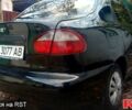 Черный Дэу Ланос, объемом двигателя 1.5 л и пробегом 276 тыс. км за 2000 $, фото 2 на Automoto.ua