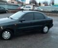 Чорний Деу Ланос, об'ємом двигуна 1.5 л та пробігом 450 тис. км за 1750 $, фото 1 на Automoto.ua