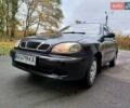 Чорний Деу Ланос, об'ємом двигуна 1.5 л та пробігом 352 тис. км за 2000 $, фото 1 на Automoto.ua