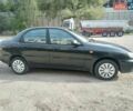 Черный Дэу Ланос, объемом двигателя 1.5 л и пробегом 184 тыс. км за 3200 $, фото 3 на Automoto.ua