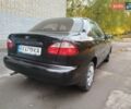 Черный Дэу Ланос, объемом двигателя 1.5 л и пробегом 351 тыс. км за 2000 $, фото 2 на Automoto.ua