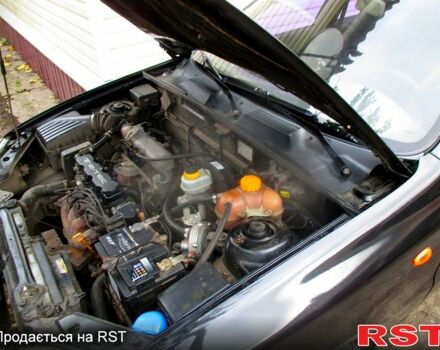 Черный Дэу Ланос, объемом двигателя 1.5 л и пробегом 230 тыс. км за 2000 $, фото 9 на Automoto.ua