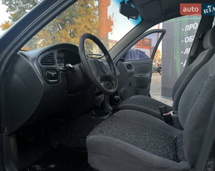 Черный Дэу Ланос, объемом двигателя 1.5 л и пробегом 209 тыс. км за 2400 $, фото 8 на Automoto.ua