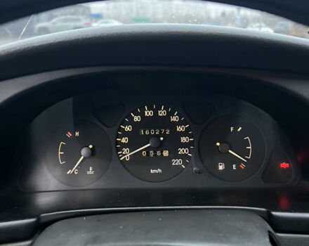 Черный Дэу Ланос, объемом двигателя 1.5 л и пробегом 161 тыс. км за 1950 $, фото 4 на Automoto.ua