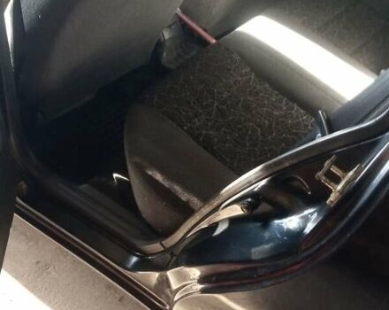 Чорний Деу Ланос, об'ємом двигуна 1.5 л та пробігом 157 тис. км за 1650 $, фото 9 на Automoto.ua