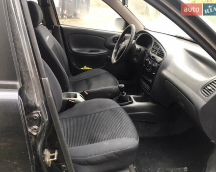 Черный Дэу Ланос, объемом двигателя 1.5 л и пробегом 150 тыс. км за 950 $, фото 6 на Automoto.ua