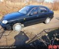 Черный Дэу Ланос, объемом двигателя 1.4 л и пробегом 147 тыс. км за 1750 $, фото 1 на Automoto.ua