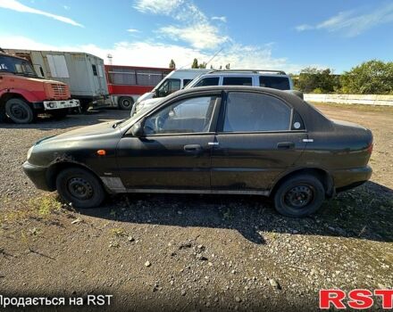 Черный Дэу Ланос, объемом двигателя 1.5 л и пробегом 516 тыс. км за 1770 $, фото 3 на Automoto.ua