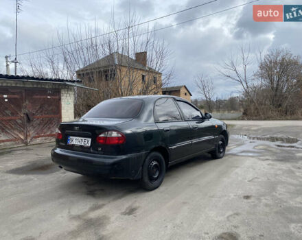 Дэу Ланос 2008 в Дубно на Automoto.ua Черный Дэу Ланос, объемом двигателя 1.4 л и пробегом 180 тыс. км за 1800 $, фото 6 на Automoto.ua