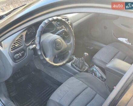 Черный Дэу Ланос, объемом двигателя 1.5 л и пробегом 216 тыс. км за 2699 $, фото 5 на Automoto.ua