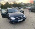 Чорний Деу Ланос, об'ємом двигуна 1.39 л та пробігом 312 тис. км за 900 $, фото 1 на Automoto.ua