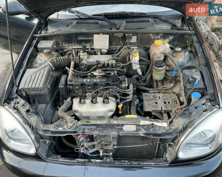 Чорний Деу Ланос, об'ємом двигуна 1.5 л та пробігом 100 тис. км за 3000 $, фото 17 на Automoto.ua