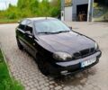 Чорний Деу Ланос, об'ємом двигуна 1.5 л та пробігом 187 тис. км за 2500 $, фото 1 на Automoto.ua