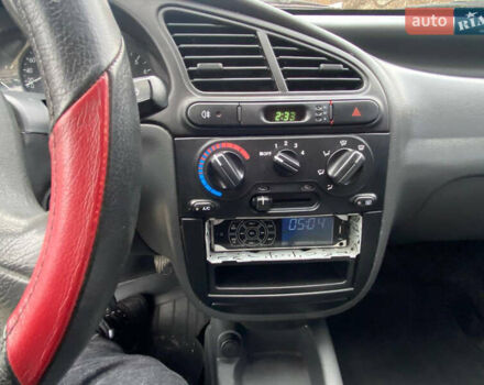 Черный Дэу Ланос, объемом двигателя 1.5 л и пробегом 231 тыс. км за 2900 $, фото 11 на Automoto.ua