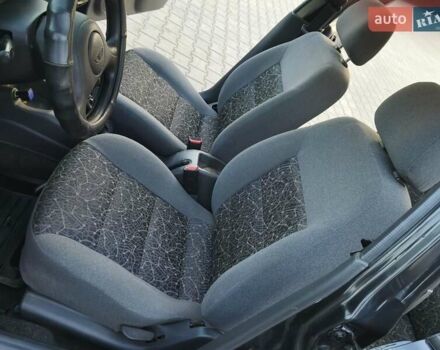 Черный Дэу Ланос, объемом двигателя 1.4 л и пробегом 120 тыс. км за 3100 $, фото 9 на Automoto.ua