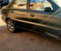 Чорний Деу Ланос, об'ємом двигуна 1.4 л та пробігом 0 тис. км за 1300 $, фото 1 на Automoto.ua
