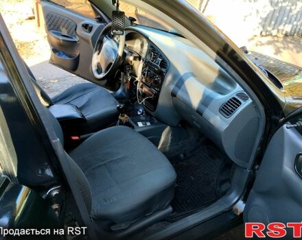 Чорний Деу Ланос, об'ємом двигуна 1.6 л та пробігом 238 тис. км за 2700 $, фото 9 на Automoto.ua