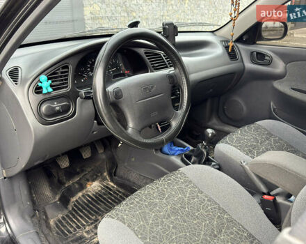 Чорний Деу Ланос, об'ємом двигуна 1.6 л та пробігом 40 тис. км за 3900 $, фото 5 на Automoto.ua