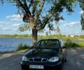 Черный Дэу Ланос, объемом двигателя 1.39 л и пробегом 160 тыс. км за 1350 $, фото 1 на Automoto.ua
