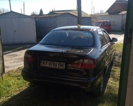 Чорний Деу Ланос, об'ємом двигуна 1.5 л та пробігом 157 тис. км за 1650 $, фото 4 на Automoto.ua