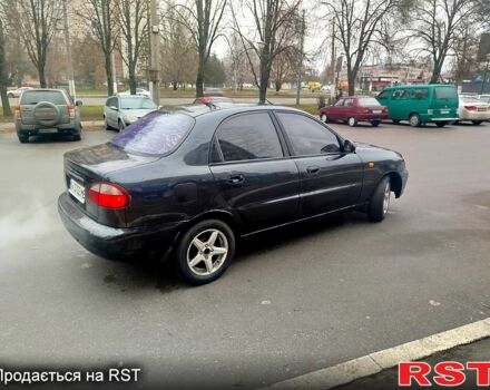 Черный Дэу Ланос, объемом двигателя 1.6 л и пробегом 200 тыс. км за 2100 $, фото 2 на Automoto.ua