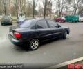 Черный Дэу Ланос, объемом двигателя 1.6 л и пробегом 200 тыс. км за 2100 $, фото 2 на Automoto.ua