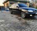 Черный Дэу Ланос, объемом двигателя 1.6 л и пробегом 115 тыс. км за 3800 $, фото 1 на Automoto.ua