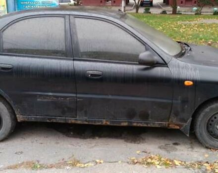 Чорний Деу Ланос, об'ємом двигуна 1.5 л та пробігом 220 тис. км за 800 $, фото 1 на Automoto.ua