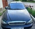 Черный Дэу Ланос, объемом двигателя 1.5 л и пробегом 209 тыс. км за 800 $, фото 1 на Automoto.ua