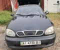 Черный Дэу Ланос, объемом двигателя 1.5 л и пробегом 300 тыс. км за 1900 $, фото 1 на Automoto.ua