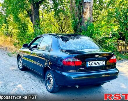 Черный Дэу Ланос, объемом двигателя 1.4 л и пробегом 303 тыс. км за 1199 $, фото 1 на Automoto.ua