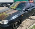 Черный Дэу Ланос, объемом двигателя 1.5 л и пробегом 251 тыс. км за 1700 $, фото 1 на Automoto.ua