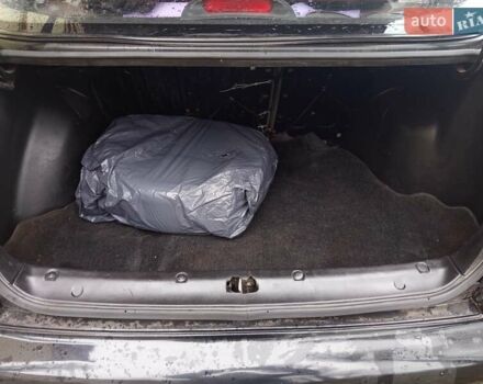 Черный Дэу Ланос, объемом двигателя 1.5 л и пробегом 180 тыс. км за 2300 $, фото 2 на Automoto.ua