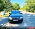 Черный Дэу Ланос, объемом двигателя 1.4 л и пробегом 303 тыс. км за 1199 $, фото 4 на Automoto.ua
