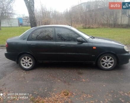 Чорний Деу Ланос, об'ємом двигуна 1.6 л та пробігом 230 тис. км за 1750 $, фото 8 на Automoto.ua