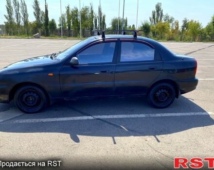 Черный Дэу Ланос, объемом двигателя 1.5 л и пробегом 251 тыс. км за 1350 $, фото 2 на Automoto.ua