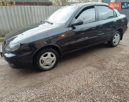 Черный Дэу Ланос, объемом двигателя 1.5 л и пробегом 200 тыс. км за 2100 $, фото 2 на Automoto.ua