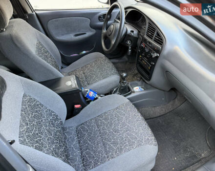 Черный Дэу Ланос, объемом двигателя 1.5 л и пробегом 100 тыс. км за 2900 $, фото 30 на Automoto.ua