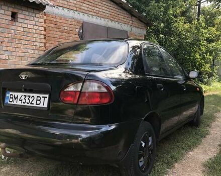 Черный Дэу Ланос, объемом двигателя 1.5 л и пробегом 160 тыс. км за 2750 $, фото 1 на Automoto.ua