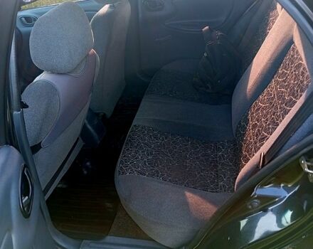 Черный Дэу Ланос, объемом двигателя 1.5 л и пробегом 230 тыс. км за 1500 $, фото 9 на Automoto.ua