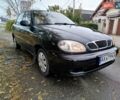 Чорний Деу Ланос, об'ємом двигуна 1.5 л та пробігом 351 тис. км за 2000 $, фото 1 на Automoto.ua