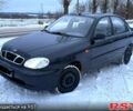 Черный Дэу Ланос, объемом двигателя 1.4 л и пробегом 164 тыс. км за 2400 $, фото 1 на Automoto.ua