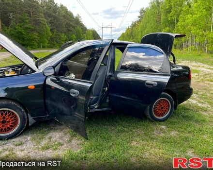Деу Ланос 2008 у Вышгороде на Automoto.ua Чорний Деу Ланос, об'ємом двигуна 1.5 л та пробігом 210 тис. км за 1900 $, фото 10 на Automoto.ua